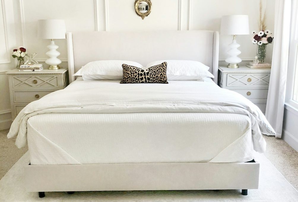 white bed with white bed linen