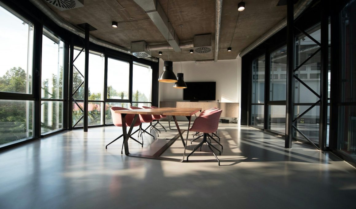 photo of dining table and chairs inside room