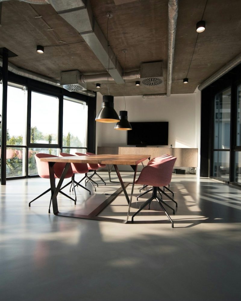 photo of dining table and chairs inside room