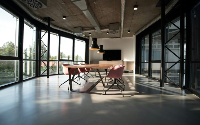 photo of dining table and chairs inside room